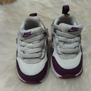 Nike White and Purple Sneakers with Classic Design